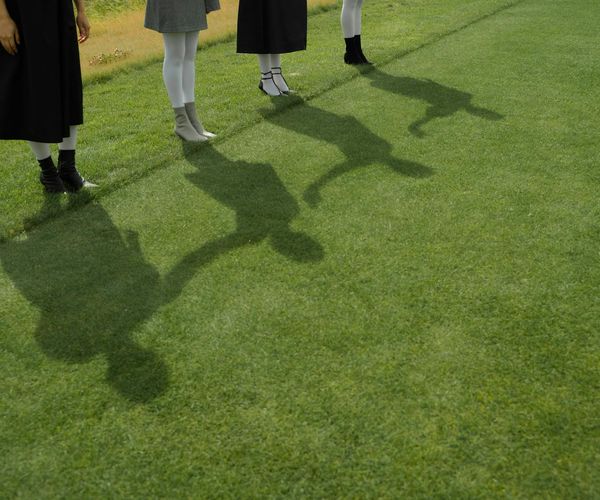 Group of people sharing a positive moment, symbolizing community.